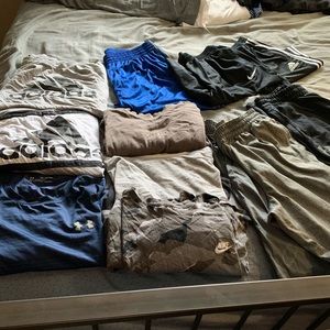 6 shirts, 4 shorts, and 2 sweatpants. All size 2x Nike, Adidas, and Under Armour